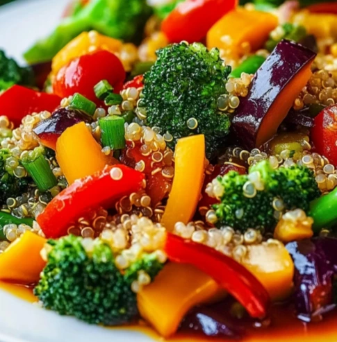 Healthy Quinoa Vegetable Bowl with colorful stir-fried vegetables